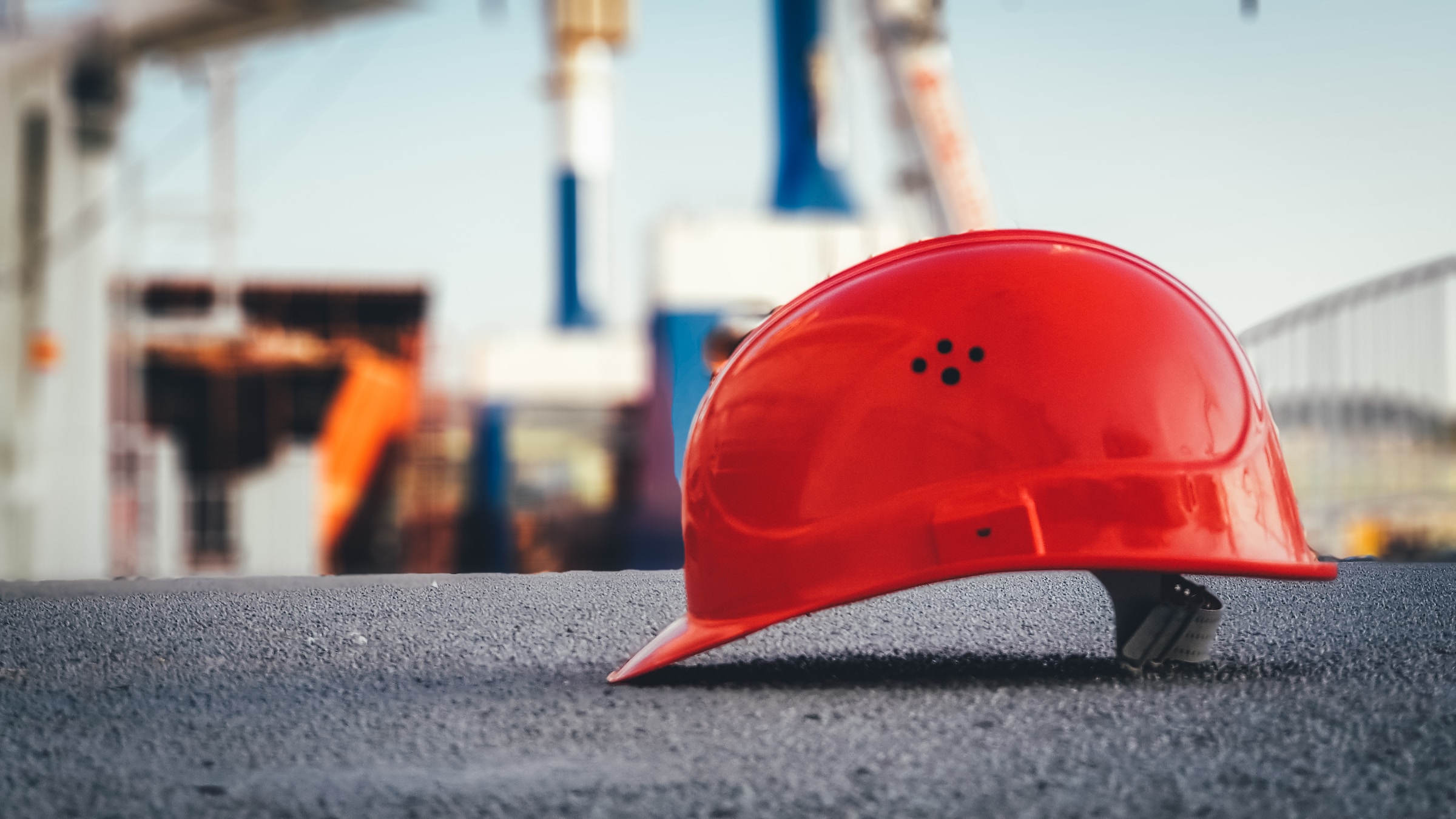 hardhat of a FIFO worker sitting on the ground