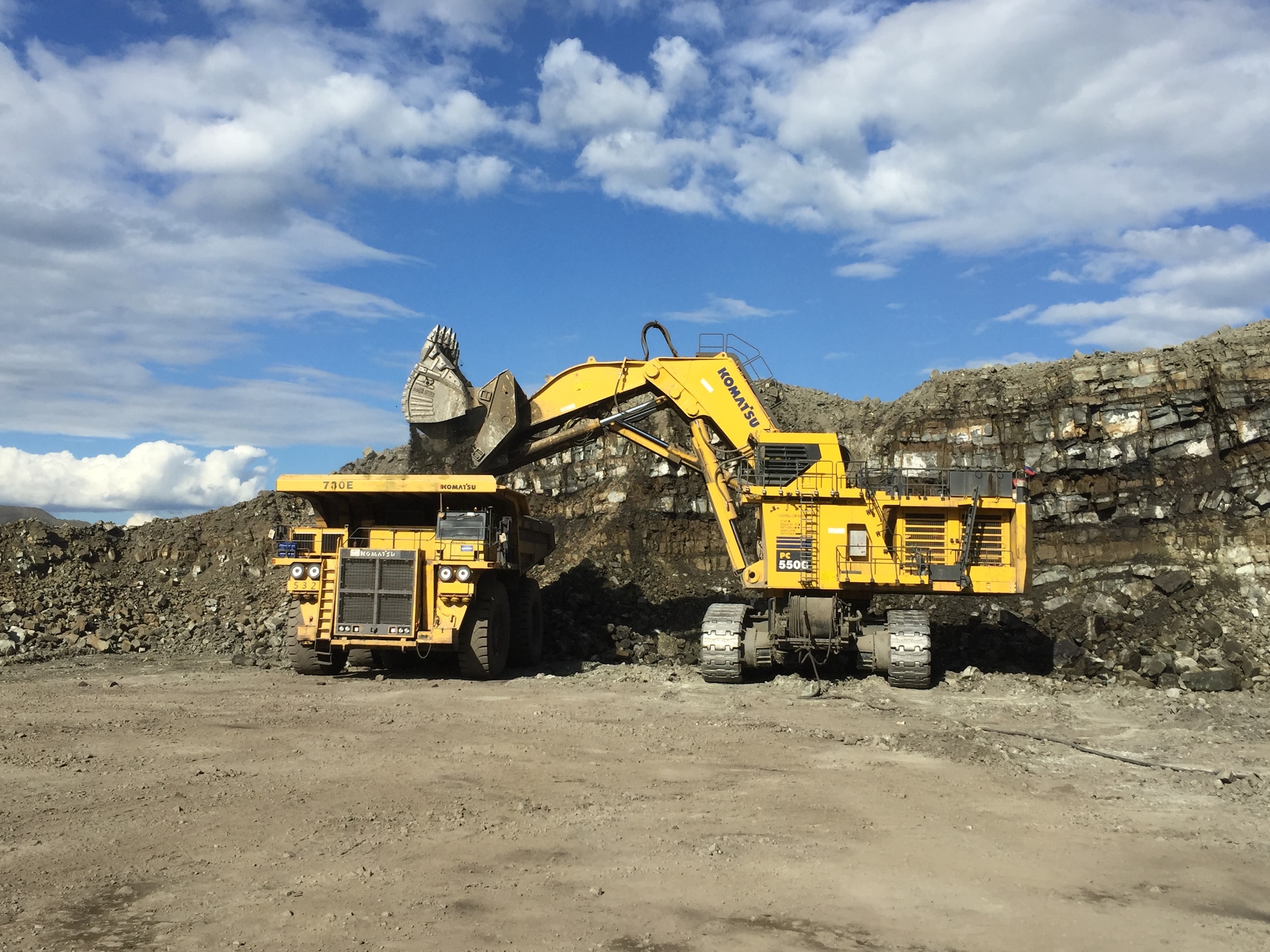 two mining machines side by side in Australian mine site